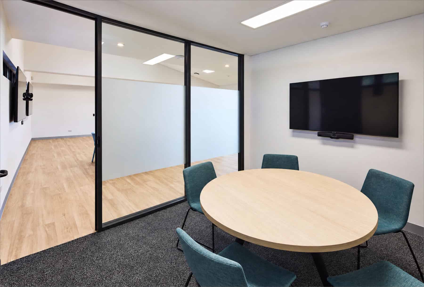 Meeting room with display and conferencing camera at Aspect Vern Barnett School